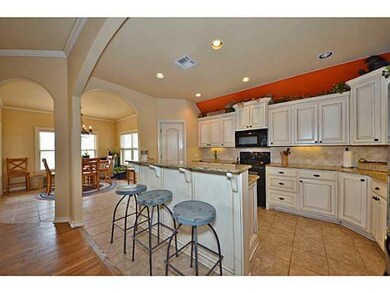 Kitchen. island breakfast bar with sink overlookin