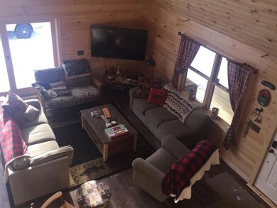 Looking into great room from loft.