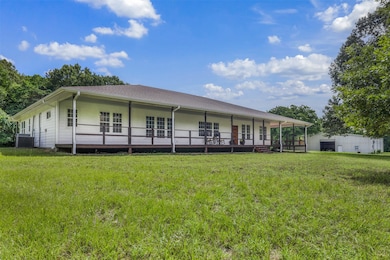 Main house with spacious shop just steps away