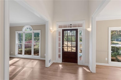 Open floor plan with large rooms, light, neutral m