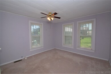Bedroom at back of home three great windows and is