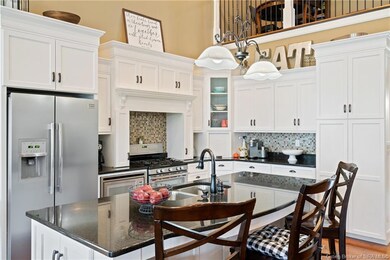Gorgeous cabinetry with a kitchen island.
