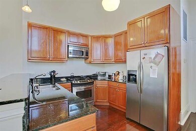 Kitchen. The kitchen opens up to the living room a
