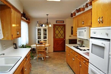 The light and bright kitchen has plenty of space!