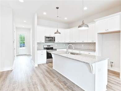 Spacious, open concept kitchen and living area