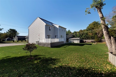Side and rear exterior, beautiful yard