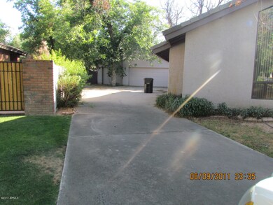 View of long Driveway to 3 car garage