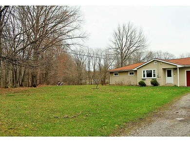 Exterior Front. Large, level yard for outdoor acti