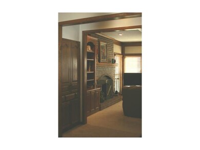 Separate wet-bar area and beautiful built in books