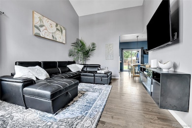 Open-concept living with **vaulted ceilings**, warm natural light, and inviting flow.