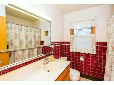Computer Room. Classic 50 s bath with all tile in 