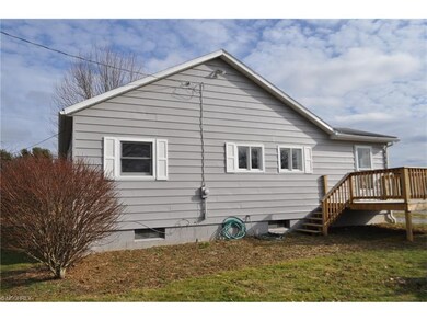 Back of house With new deck