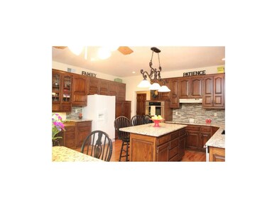 Large eat-in kitchen with hardwood floors, new gra