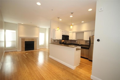 Kitchen has a nice breakfast bar to maximize space