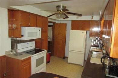 Oak kitchen with all appliances. Stainless steel b