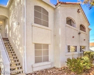 View of home's exterior featuring stucco siding