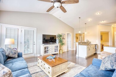 Living room featuring light wood-type flooring, be