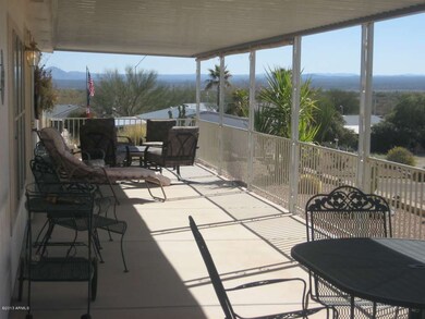 front patio with fencing around. Views!