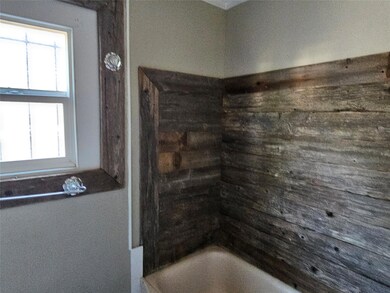 Bathroom with  shower combination and plenty of na