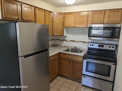 1565 Violet Ave unit A, Titusville, FL 32796 - photo 6