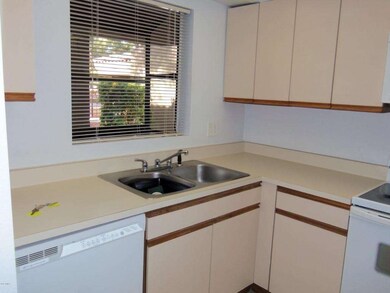 Kitchen, looks out to Entry area