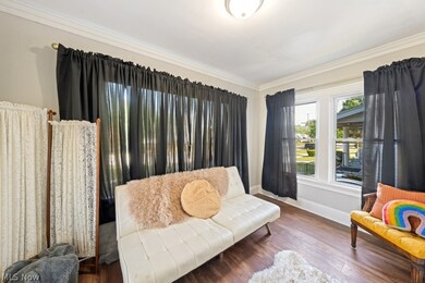 Season room with ample windows,and wood flooring
