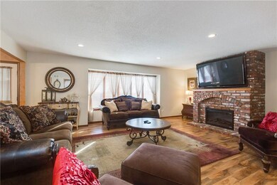 Spacious great room with pergo floors.