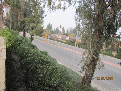house sits high up above the street below. pretty 