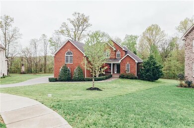 All brick home with integrated security, lighting, motion, and air conditioning that can be controlled from anywhere via mobile phone app