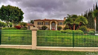 Need privacy?  This home has a full wrought iron f