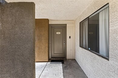 Front entrance of home with custom painted stucco