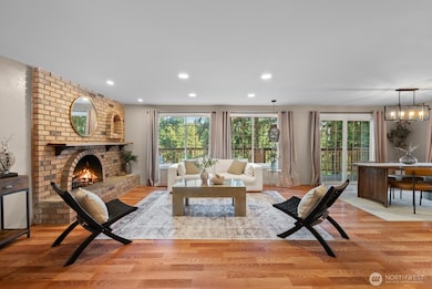 WALL OF WINDOWS TO TAKE IN ALL THE VIEWS AND WOOD BURNING FIRE PLACE