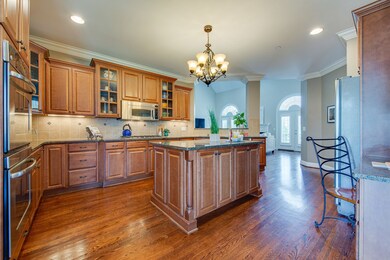 Custom cabinets with luxurious features are everywhere in this kitchen