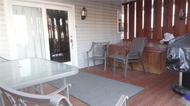 Enjoy the privacy of the covered porch with Hot Tu