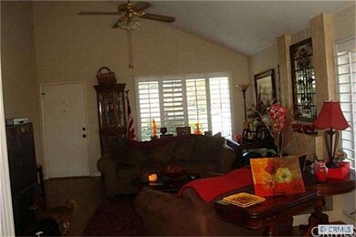 Living room  with ceiling fan.