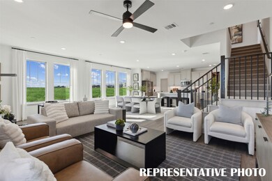 Wonderful family gatherings await in this lovely open concept living-dining area.  REPRESENTATIVE PHOTO