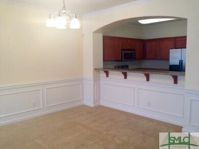 Dining area and breakfast bar. Note the nice oval 
