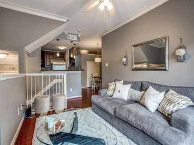 Living area featuring visible vents, wood finished