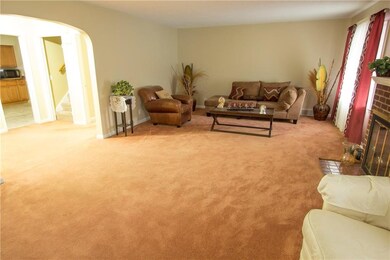 Another view of the spacious 25 x 14 living room. 