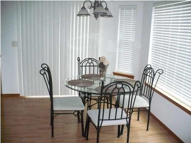 DINING AREA WITH SLIDING DOOR OUT TO BACKYARD