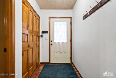 Entryway with large closets