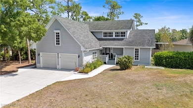 View of front facade featuring covered porch, a fr