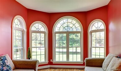 Living Room with dramatic walk-out bay window and