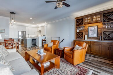 Hardwood floors and wine cabinet