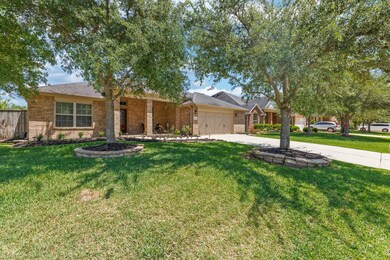 Home is beautifully landscaped with mature trees