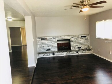 Living room with built in fire place