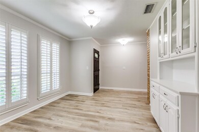 Formal dining area can double as a great work from