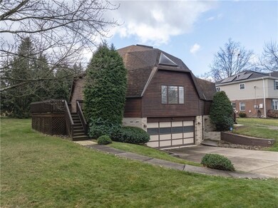 Two car garage, entry door to lower level.  Consid