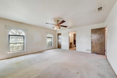 Unfurnished bedroom featuring baseboards, ceiling 
