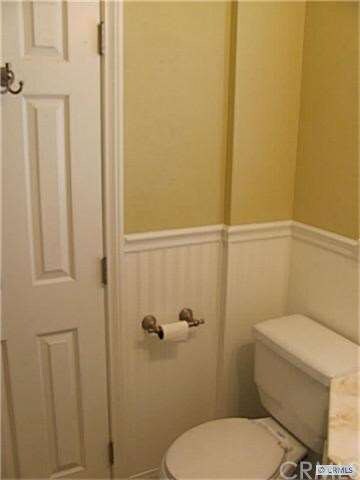 3/4 bath with shower+ wainscoting.